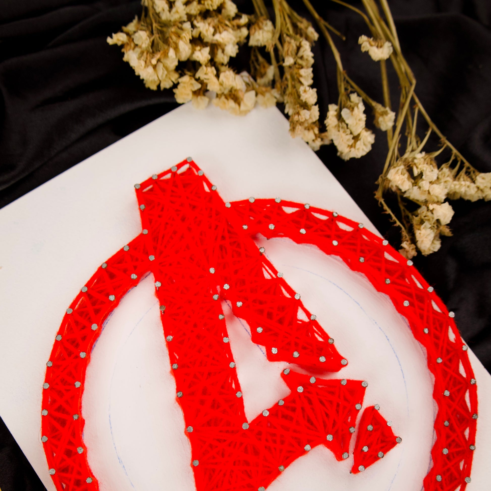 Marvel Avengers string art wall hanging – personalized handmade gift for superhero lovers.