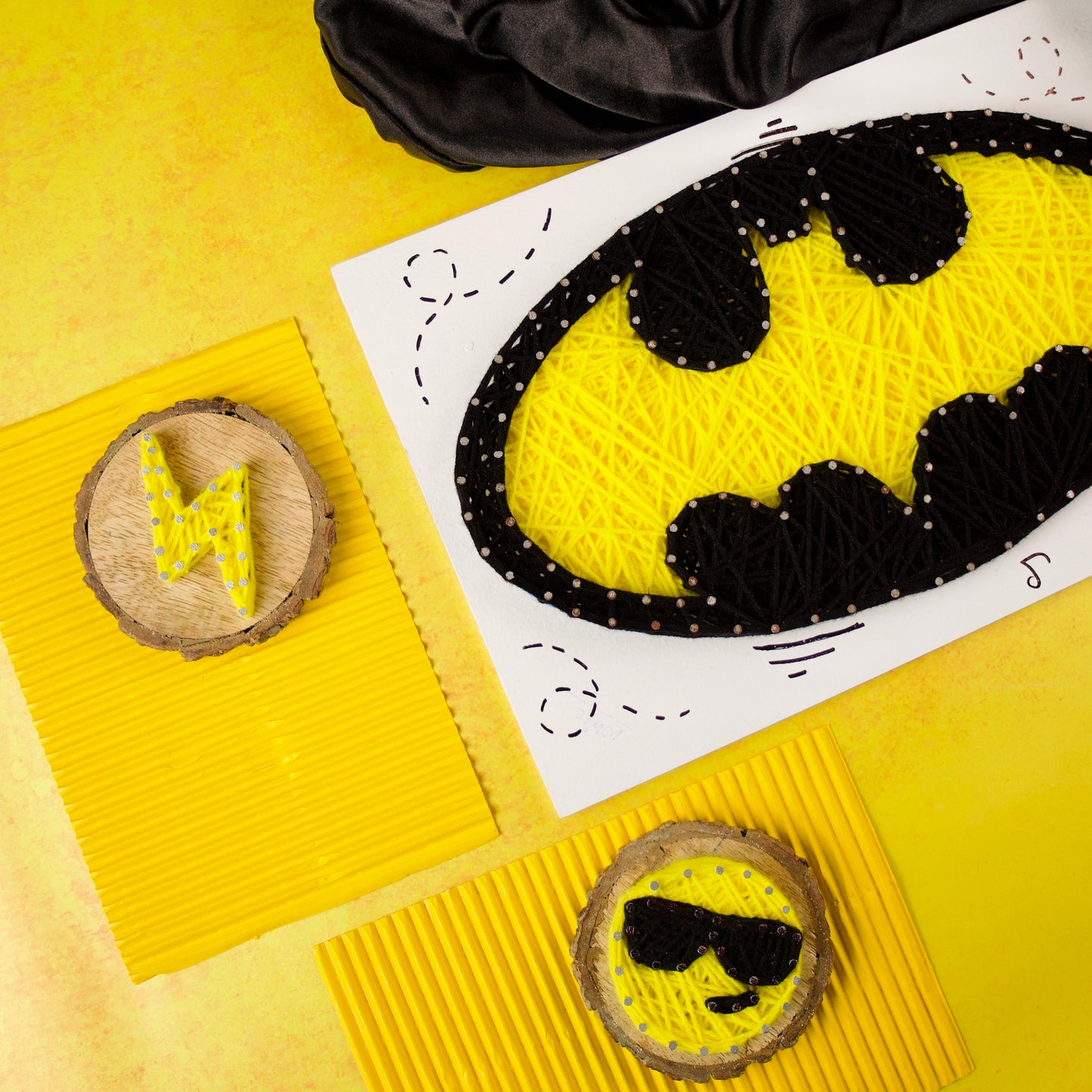 Unique Batman logo made with thread art, ideal for personalised superhero-themed gifts.