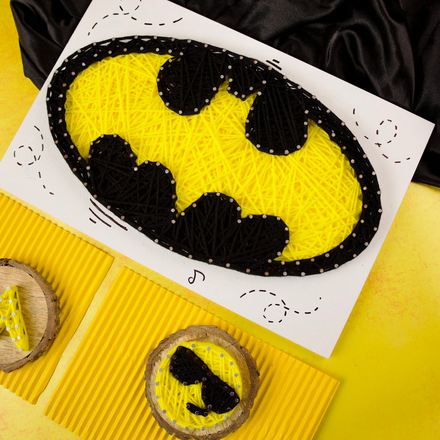 Custom Batman string art on board, a creative handmade gift for superhero lovers and collectors.