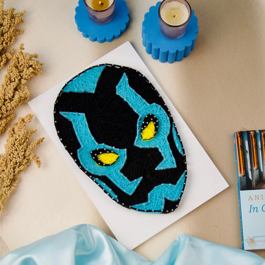 Blue Beetle string art wall decor – handmade superhero design for unique room accents and gifts.