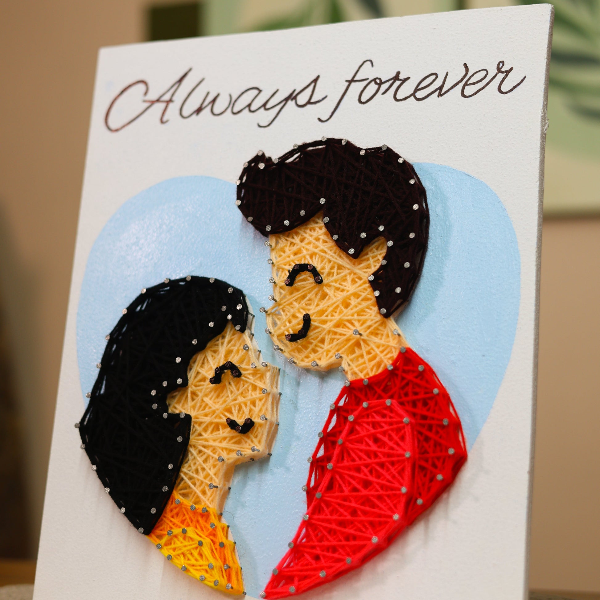 Couple in love string art featuring touching foreheads and “Always forever” message – handmade romantic decor for couples