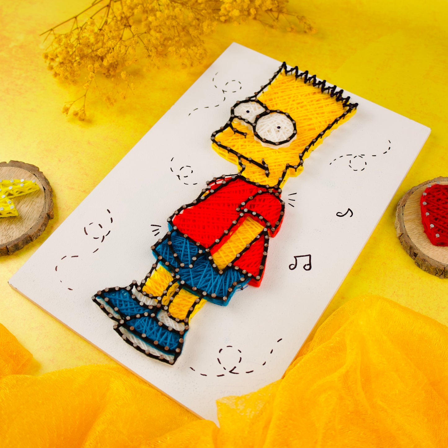 Bart Simpson string art portrait in red shirt and blue shorts, unique handmade cartoon wall hanging.
