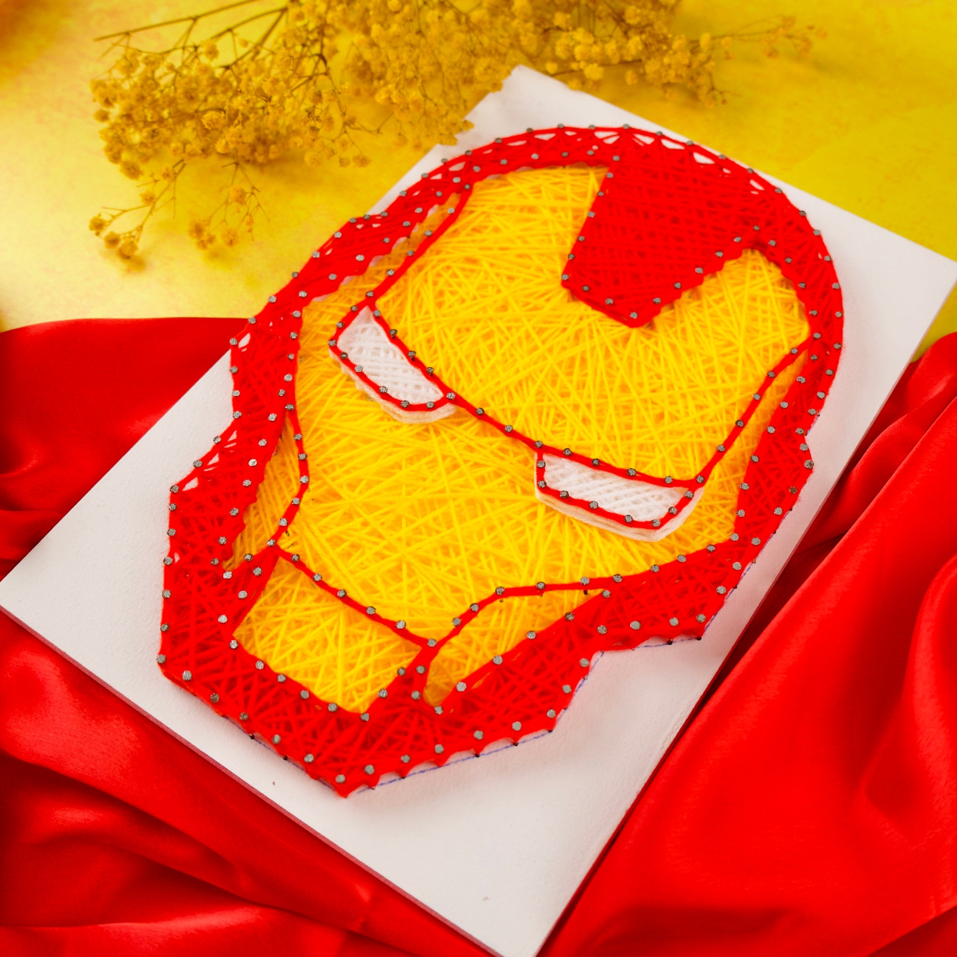 Handmade Iron Man string artwork – unique home decor inspired by Marvel Avengers.