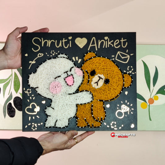 String art depicting two teddy bears embracing, symbolizing love and affection, ideal for personalized gifts for couples.