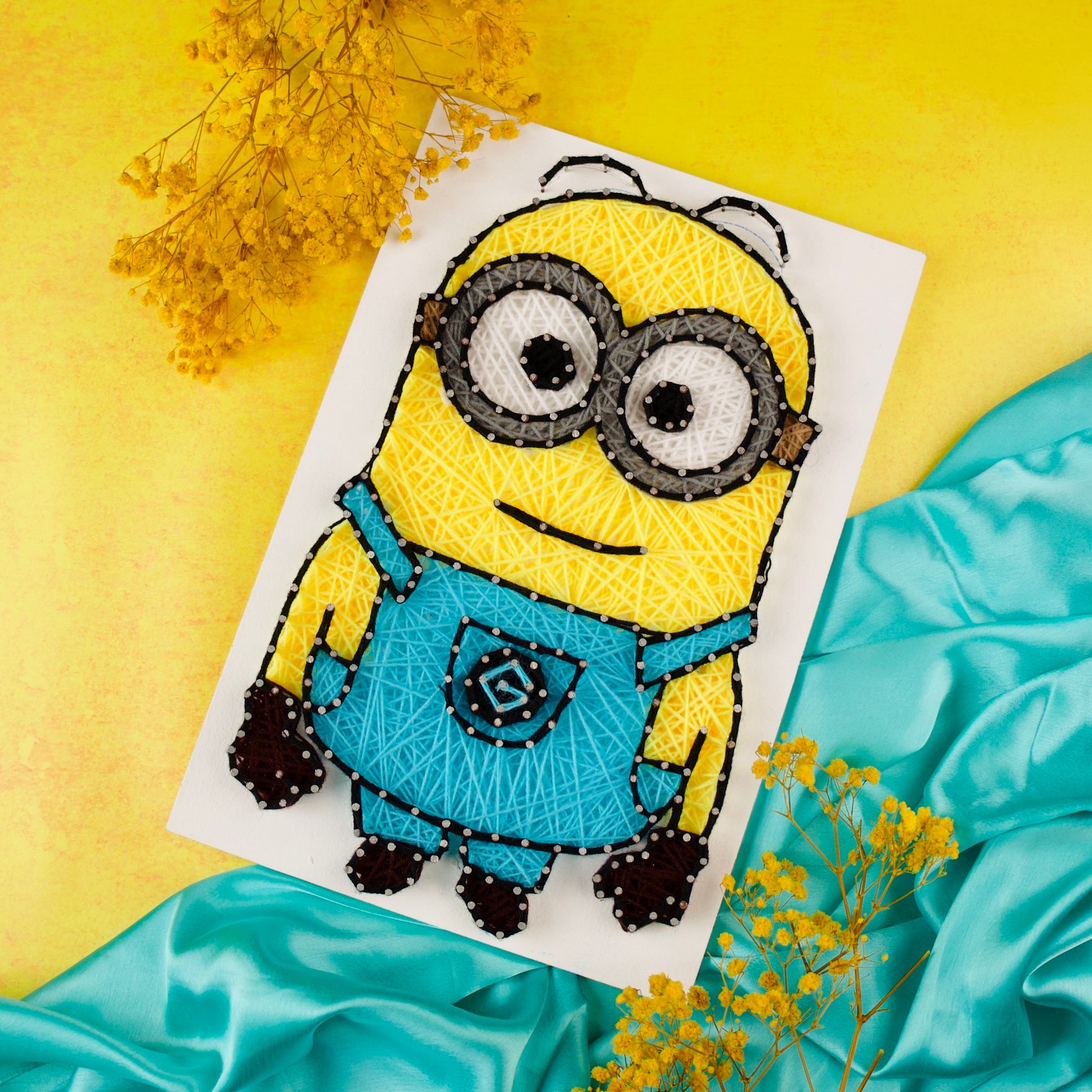 Minion-Themed String Art Craft – Unique Wall Hanging for Animation Lovers.