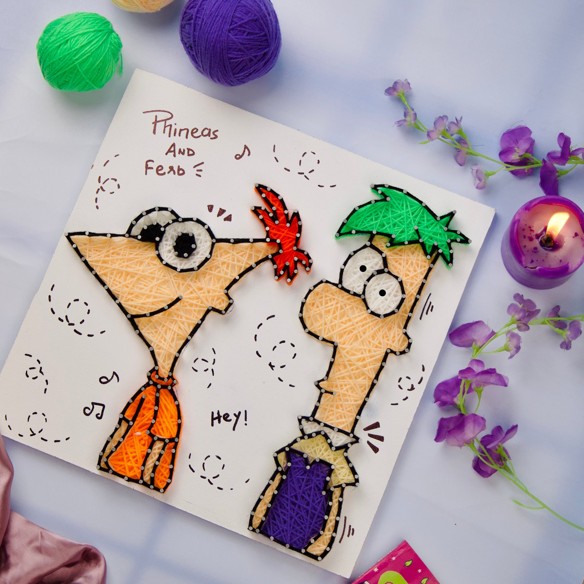 Unique Phineas and Ferb nail and string art, ideal gift for lovers of animated shows and DIY crafts.
