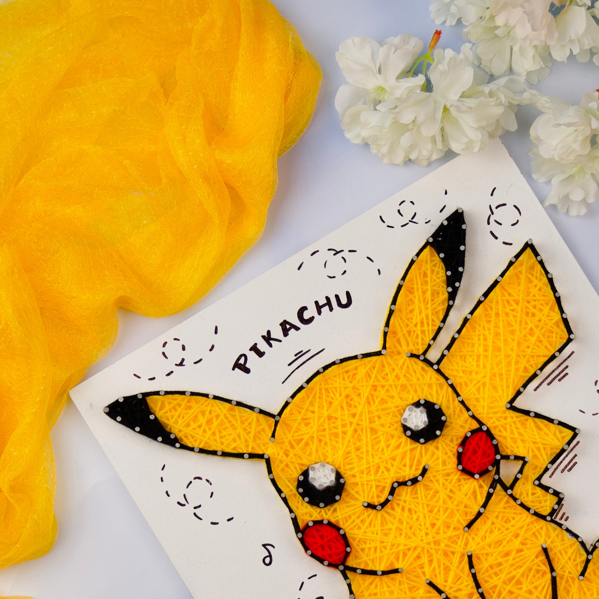 Personalized Pikachu string art gift for Pokémon lovers, handcrafted with vibrant threads.