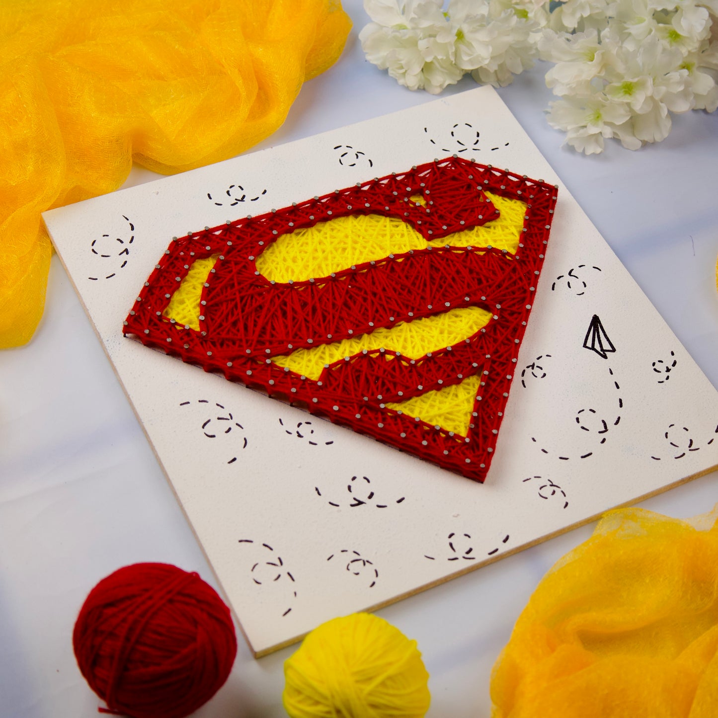 Superman superhero wall decor in string art style, unique gift idea for comic lovers and collectors.