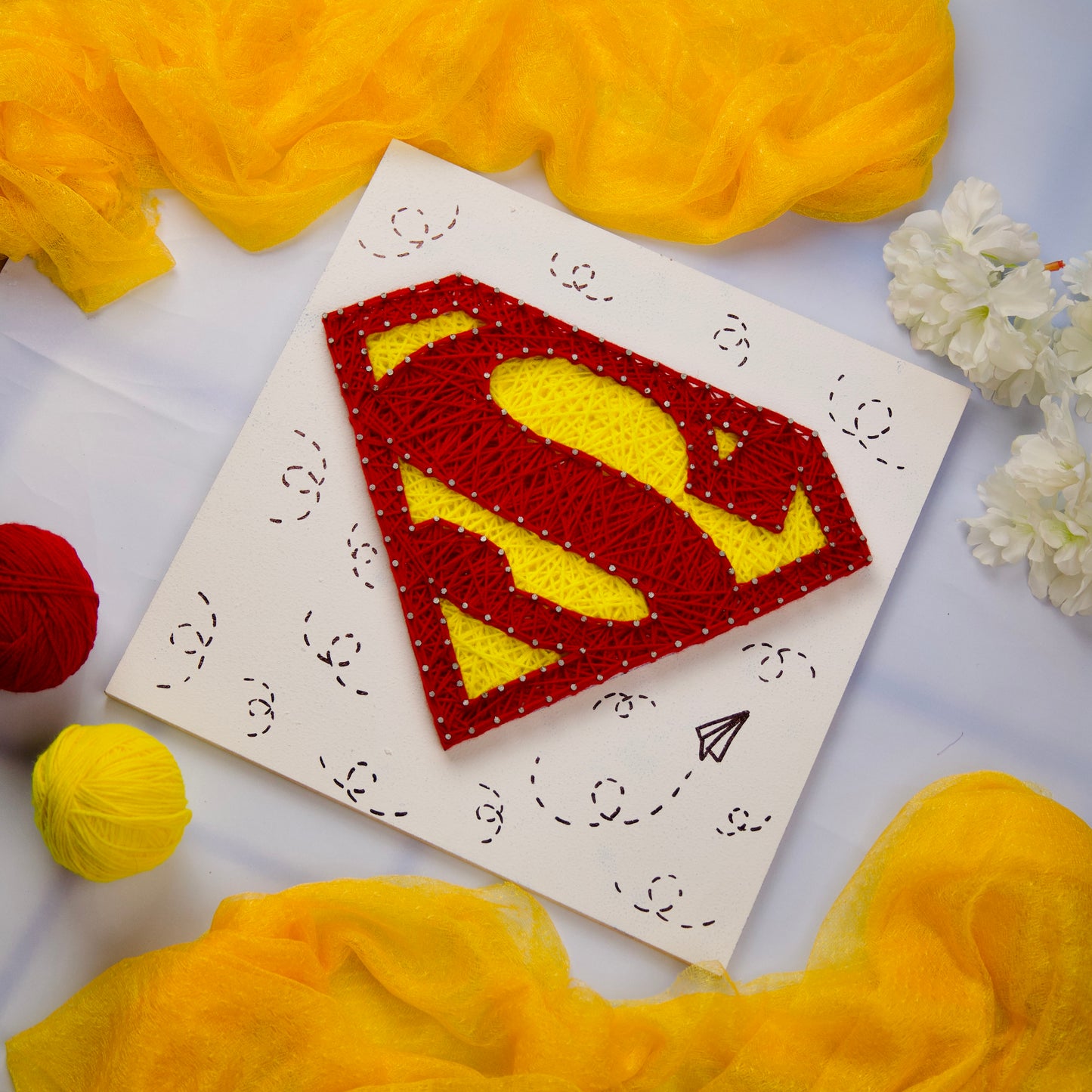Vibrant Superman string art wall piece, handcrafted superhero decor for home, office, or gifting.