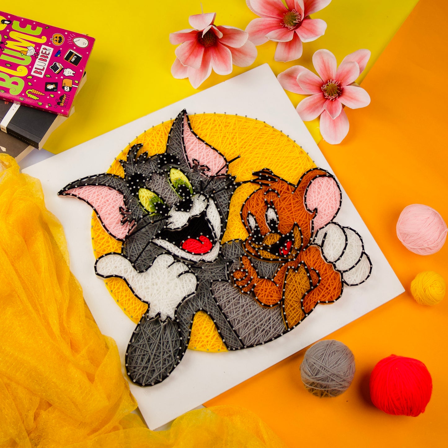 Handmade Tom and Jerry string art wall decor, perfect gift for cartoon lovers and kids’ room.