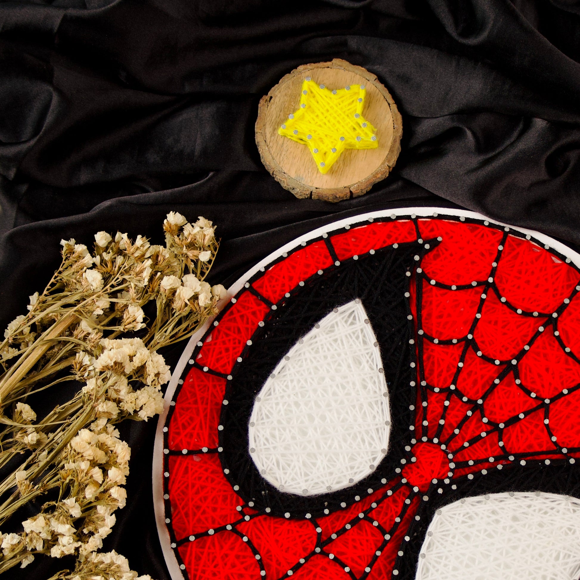 Red and black Spider-Man web string art – unique handcrafted superhero wall piece.