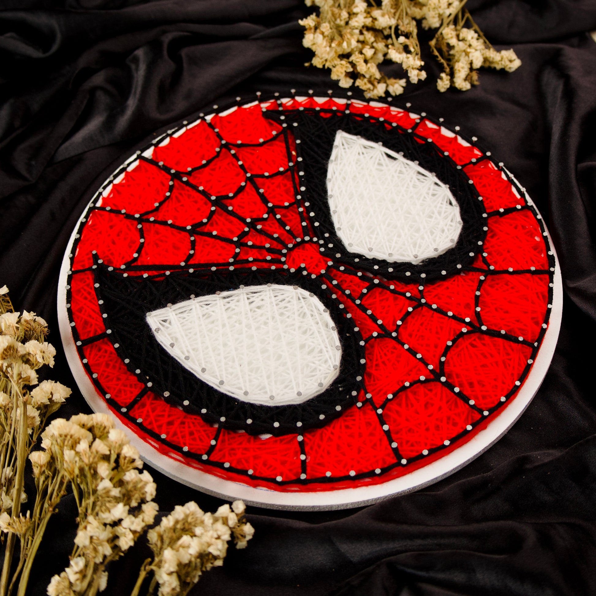Marvel Spider-Man logo string art – geeky home decor for fans of the web-slinger.