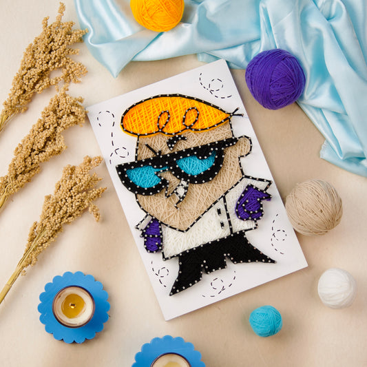Colorful handmade string art of Dexter from Dexter’s Laboratory – perfect for cartoon-themed room decor or gifts.